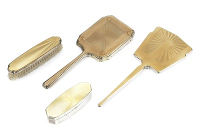 Lot 540 - A George V silver and yellow enamel trinket...