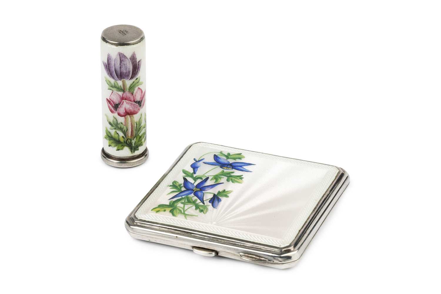 Lot 541 - A silver and enamel compact, the white...