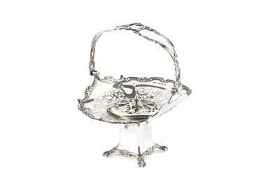 Lot 736 - A George V silver swing handled posy basket,...