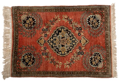 Lot 74 - A silk Persian rug, rose pink, 86cm h x 57cm w