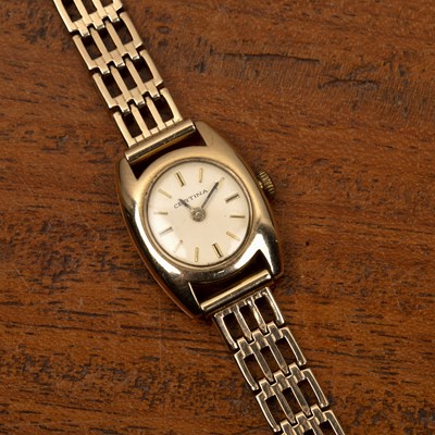 Lot 266 - A lady's 9ct gold bracelet watch by Certina...