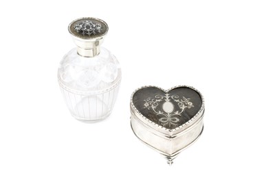 Lot 545 - An Edwardian silver and tortoiseshell heart...