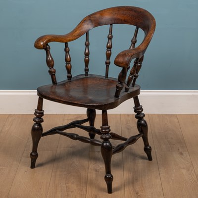 Lot 225 - A 19th century ash and elm bow-back Windsor chair