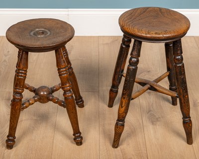 Lot 294 - Two antique elm and ash circular stools