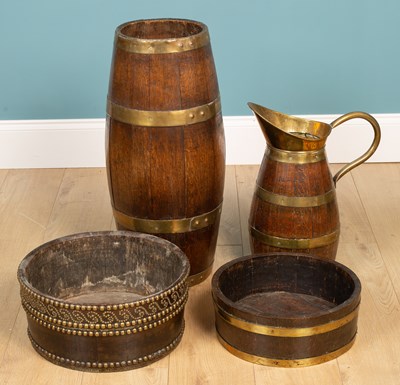 Lot 477 - A coopered brass bound stick stand; an oak coopered brass bound jug; and two jardinieres