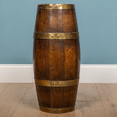 Lot 477 - A coopered brass bound stick stand; an oak coopered brass bound jug; and two jardinieres