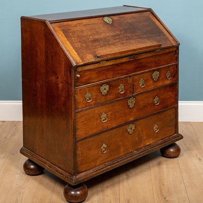 Lot 299 - A George II oak bureau