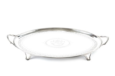 Lot 606 - A George III silver oval twin handled tray,...