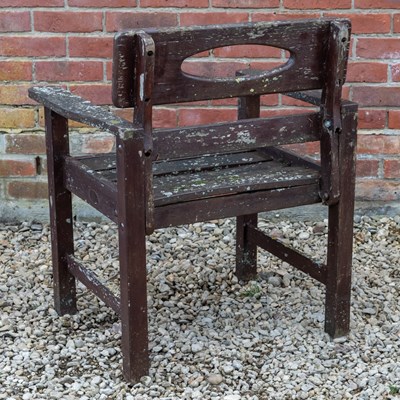 Lot 1161 - A stained teak circular garden table by Swan of Hattersley