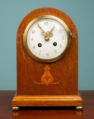 Lot 237 - A wooden mantel clock, French, mahogany with...