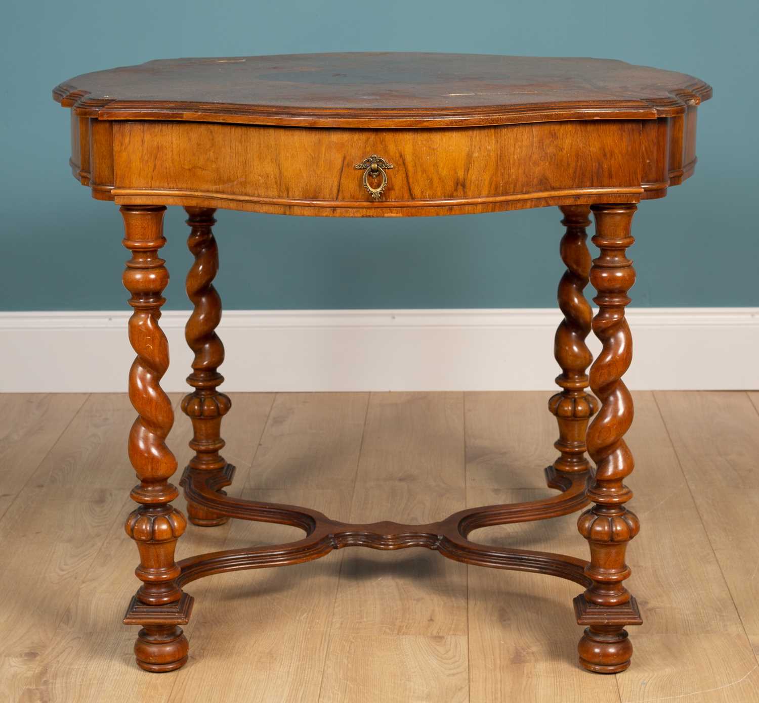 Lot 426 - A 17th-century-style walnut-shaped centre table