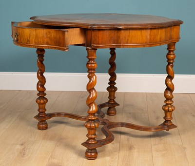 Lot 426 - A 17th-century-style walnut-shaped centre table