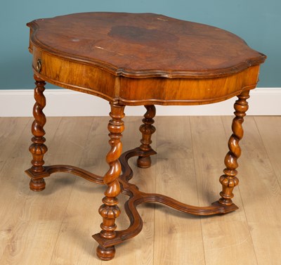 Lot 426 - A 17th-century-style walnut-shaped centre table