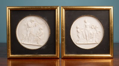 Lot 432 - A pair of circular Parian relief plaques