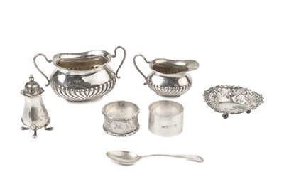 Lot 754 - A late Victorian silver half lobed small milk...