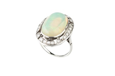 Lot 45 - An opal and diamond cluster ring, the oval...