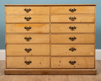 Lot 260 - A chest of drawers, oak, with twelve graduated...