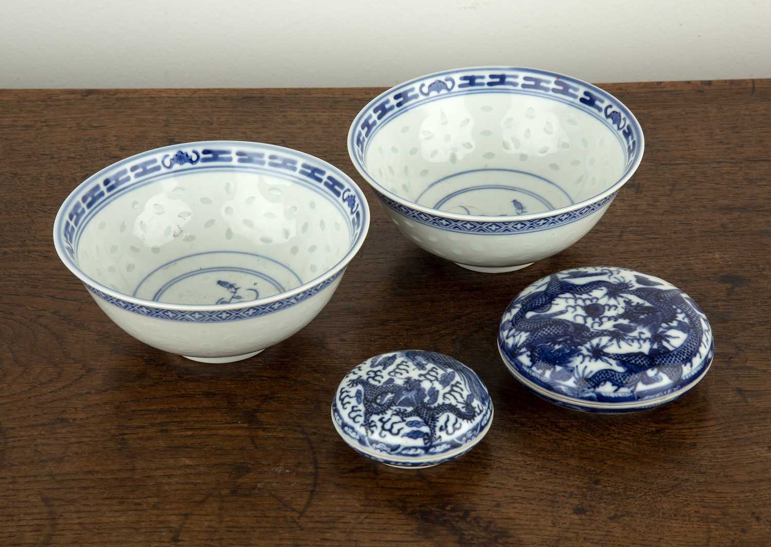 Lot 334 - Two blue and white porcelain paste pots...