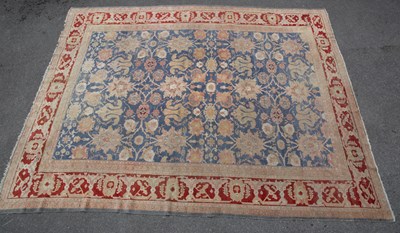 Lot 1066 - A Heritz blue ground carpet