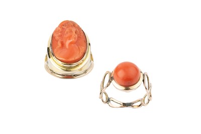 Lot 39 - Two coral dress rings, the first a cameo ring,...