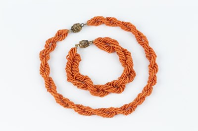 Lot 31 - A coral bead torsade necklace and bracelet...