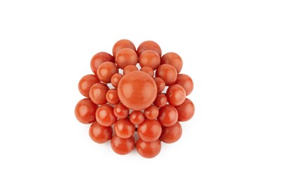 Lot 34 - A coral panel brooch, designed as a tiered...
