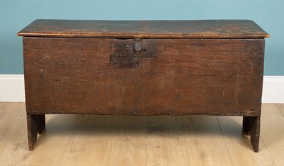 Lot 89 - An 18th century oak six plank chest or coffer...