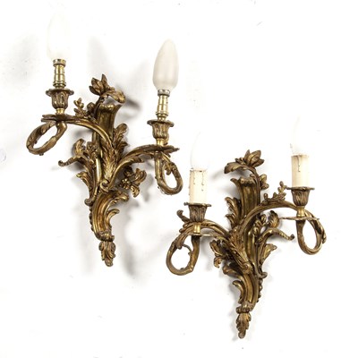 Lot 259 - Pair of gilt metal asymmetrical wall lights...