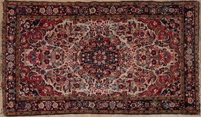 Lot 124 - A rug with pink and black floral pattern, 233...