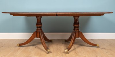 Lot 504 - A George III-style rectangular pedestal dining table