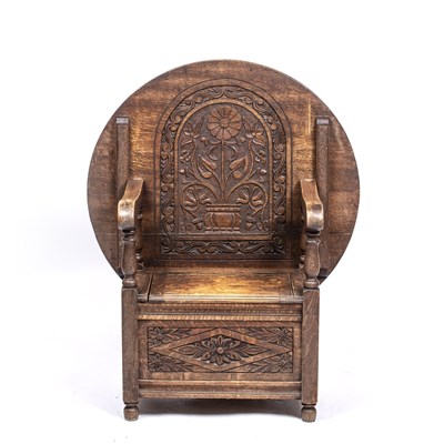 Lot 324 - An early 20th century carved oak monk's seat...