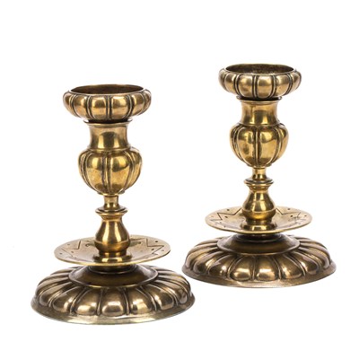 Lot 424 - A pair of 19th century Italian gilt metal candlesticks