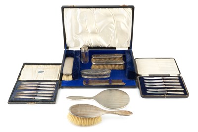 Lot 598 - A George V silver backed dressing table set,...