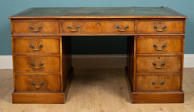 Lot 255 - A pedestal desk, mahogany, with a green...