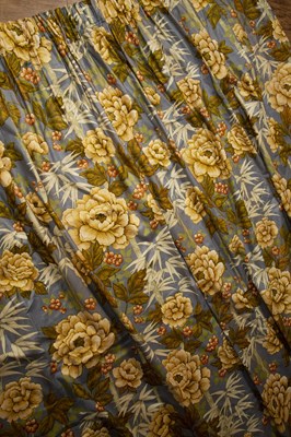 Lot 351 - Two pairs of floral curtains on blue ground,...