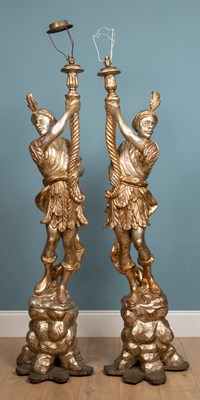 Lot 218 - A pair of large carved wooden figure...