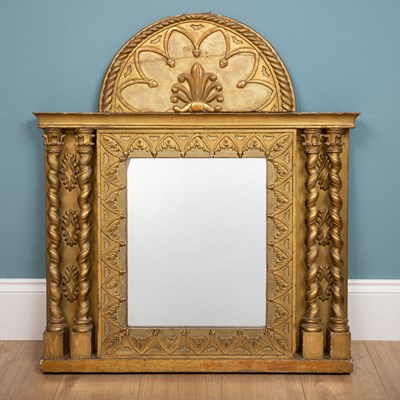 Lot 102 - A large giltwood mirror, ornately carved with...