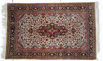 Lot 1057 - An Indian silk rug