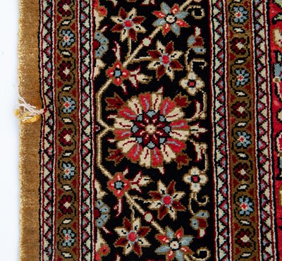 Lot 1057 - An Indian silk rug