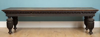 Lot 278 - A low oak table, carved legs, 203cm w x 62cm d...