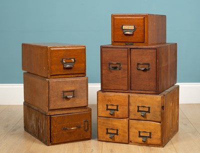 Lot 107 - A group of six various filing drawers the...