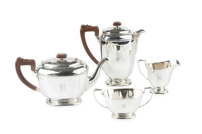 Lot 726 - A George VI silver four piece tea service, of...