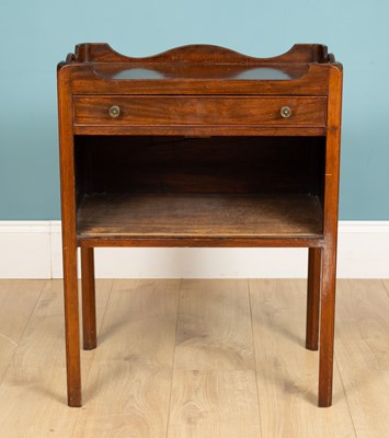 Lot 108 - A mahogany bedside cupboard with galleried top,...