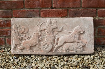 Lot 1180 - An Assyrian style terracotta wall plaque