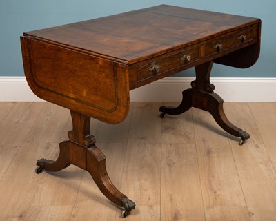 Lot 307 - A Regency rosewood sofa table with brass...