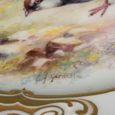 Lot 43 - A porcelain hand painted plate decorated with...