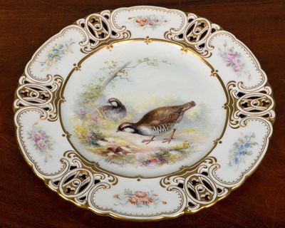 Lot 43 - A porcelain hand painted plate decorated with...