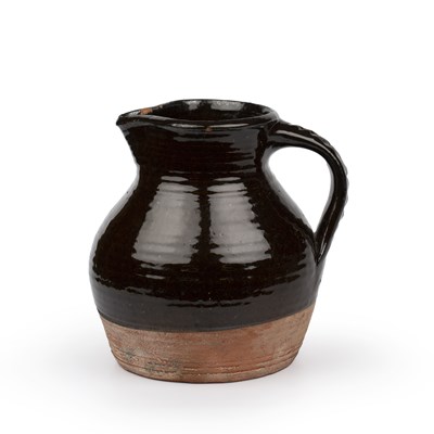 Lot 525 - Michael Cardew (1901-1983) An early jug...