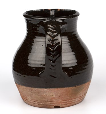 Lot 525 - Michael Cardew (1901-1983) An early jug...