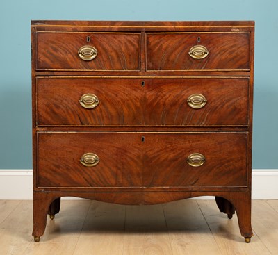 Lot 329 - A chest of drawers, mahogany, two short...